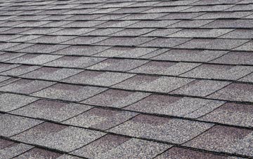 Sleight tiles for shallow pitch roofing